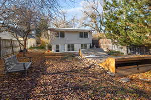 Rear view of property with a patio area