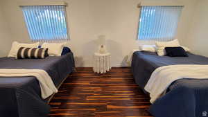 Bedroom featuring dark hardwood / wood-style flooring