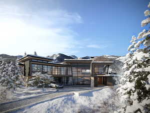 View of front of home featuring a mountain view