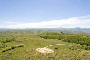 Birds eye view of property with a mountain view