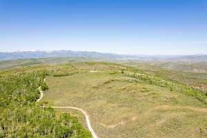 Drone / aerial view featuring a mountain view