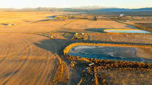 Birds eye view of property with a mountain view