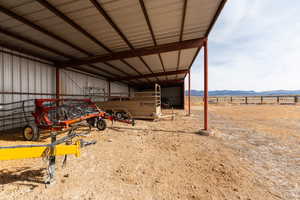 Garage with a mountain view and a rural view