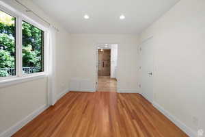 Empty room featuring light wood-type flooring