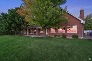 View of front of home featuring a yard