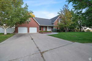 View of front of house with a front lawn