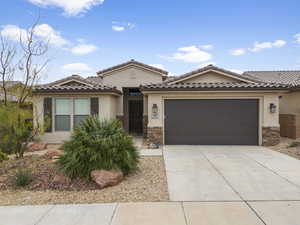 View of front of home with a garage