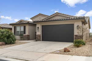 View of front of property with a garage