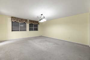 View of carpeted basement second bedroom