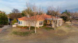 View of rear of home that sits on golf course