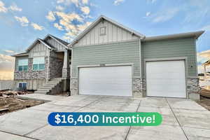 View of front of property with a garage