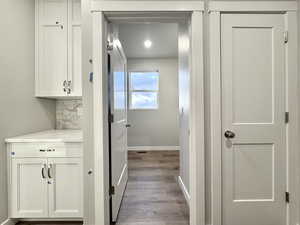 Hallway featuring light hardwood / wood-style floors