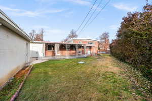 Rear view of house, covered patio