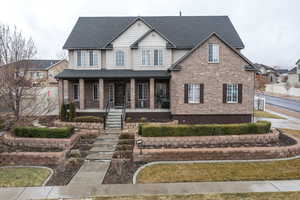 Craftsman-style house featuring covered porch