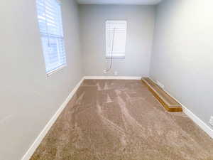 Third bedroom features new carpet, new window, new blinds, new light fixture, and an Internet connection ready to go