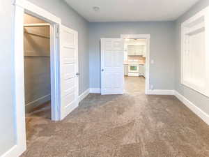 Main bedroom features new doors and a closet with easy access