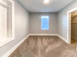 Main bedroom with new window, new blinds, and a cozy closet