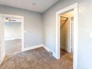 Main bedroom has a connecting closet that’s shared between bedrooms, offering convenience and extra storage