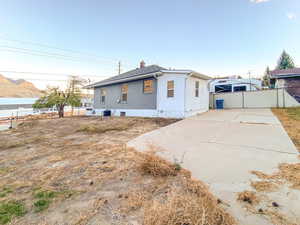 View of the home's exterior with a patio area