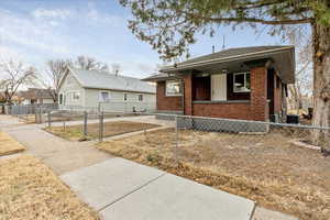 View of front of house with central AC unit