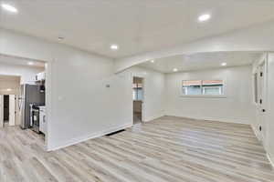 Empty room featuring light hardwood / wood-style floors