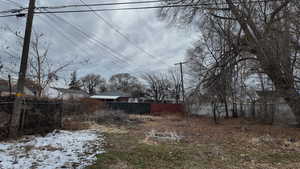 View of yard layered in snow