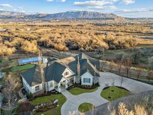 Birds eye view of property with a mountain view