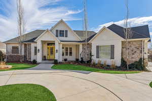 View of front of property with a front yard