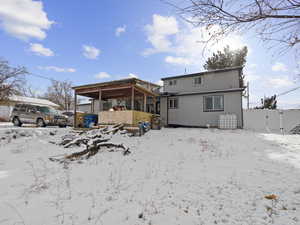 View of snow covered property