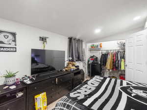 Bedroom with a closet and light wood-type flooring