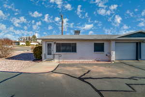 Single story home featuring a garage