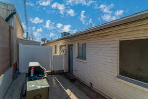 View of side of home with a patio area