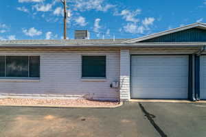 Single story home featuring a garage