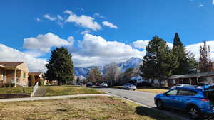 View of street featuring a mountain view, looking east