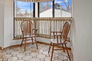 dining nook in kitchen with plenty of natural light