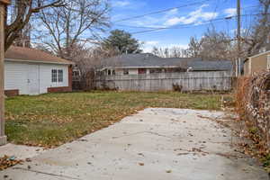 View of yard featuring a patio, or RV pad.