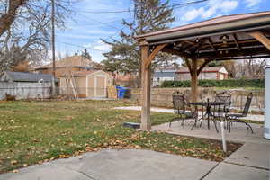 View of yard featuring a gazebo and a patio area