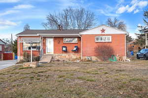 View of front of home featuring a front yard