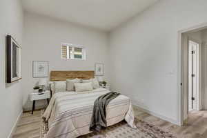 Bedroom featuring light wood-type flooring