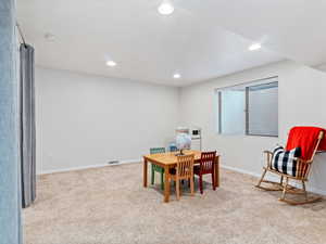 View of carpeted dining space