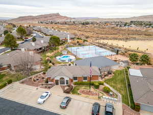 Birds eye view of property with a mountain view