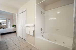 Bathroom with tile patterned floors