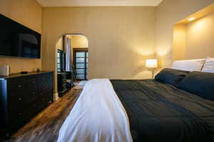 Bedroom featuring dark hardwood / wood-style floors