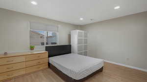 Bedroom featuring light hardwood / wood-style flooring