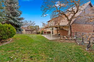 View of yard with a patio area