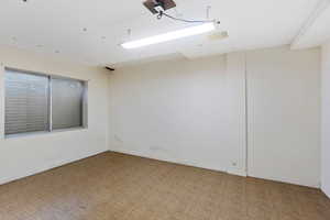 Unfurnished room featuring light parquet flooring