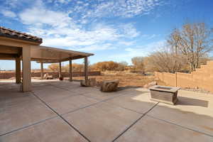 View of patio / terrace with a fire pit