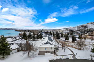 Snowy aerial view with a mountain view