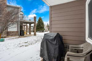 View of yard covered in snow