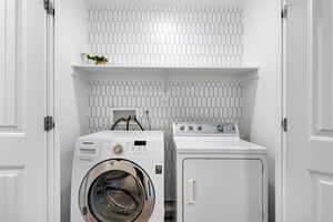 Laundry room with independent washer and dryer